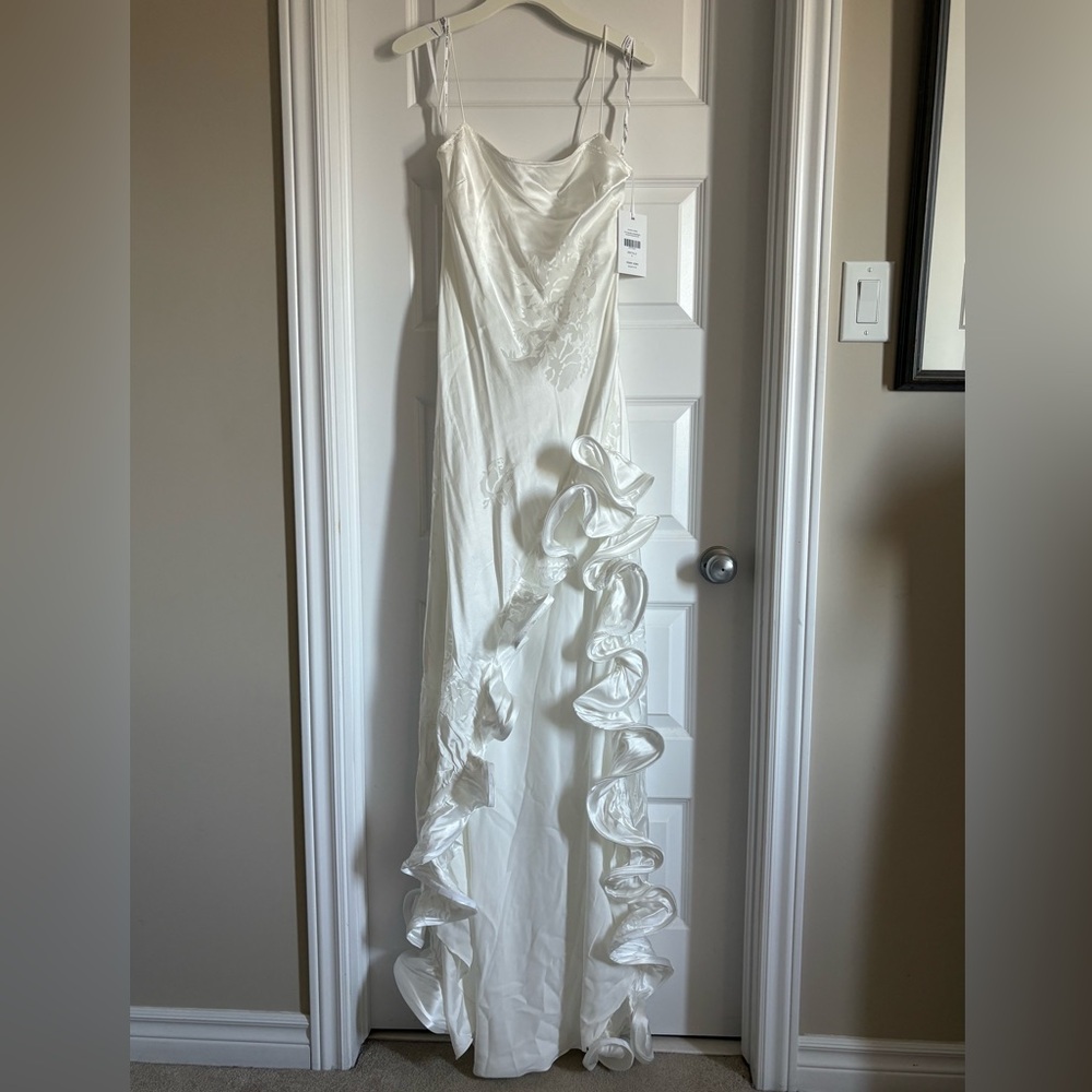 Elegant White Gown with Ruffle Details